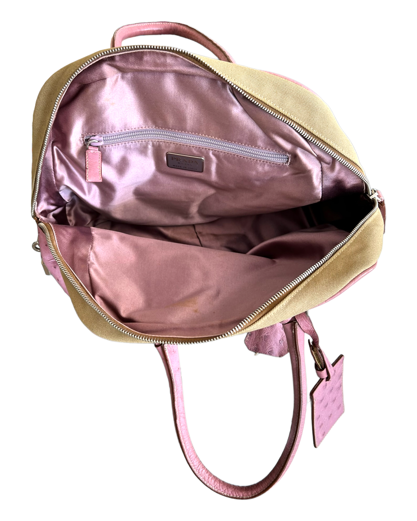Vintage Prada Beige Canapa Canvas Bowling Bag with Pink Ostrich Leather Trim. Image shows the inside of the bag with a pink silk lining