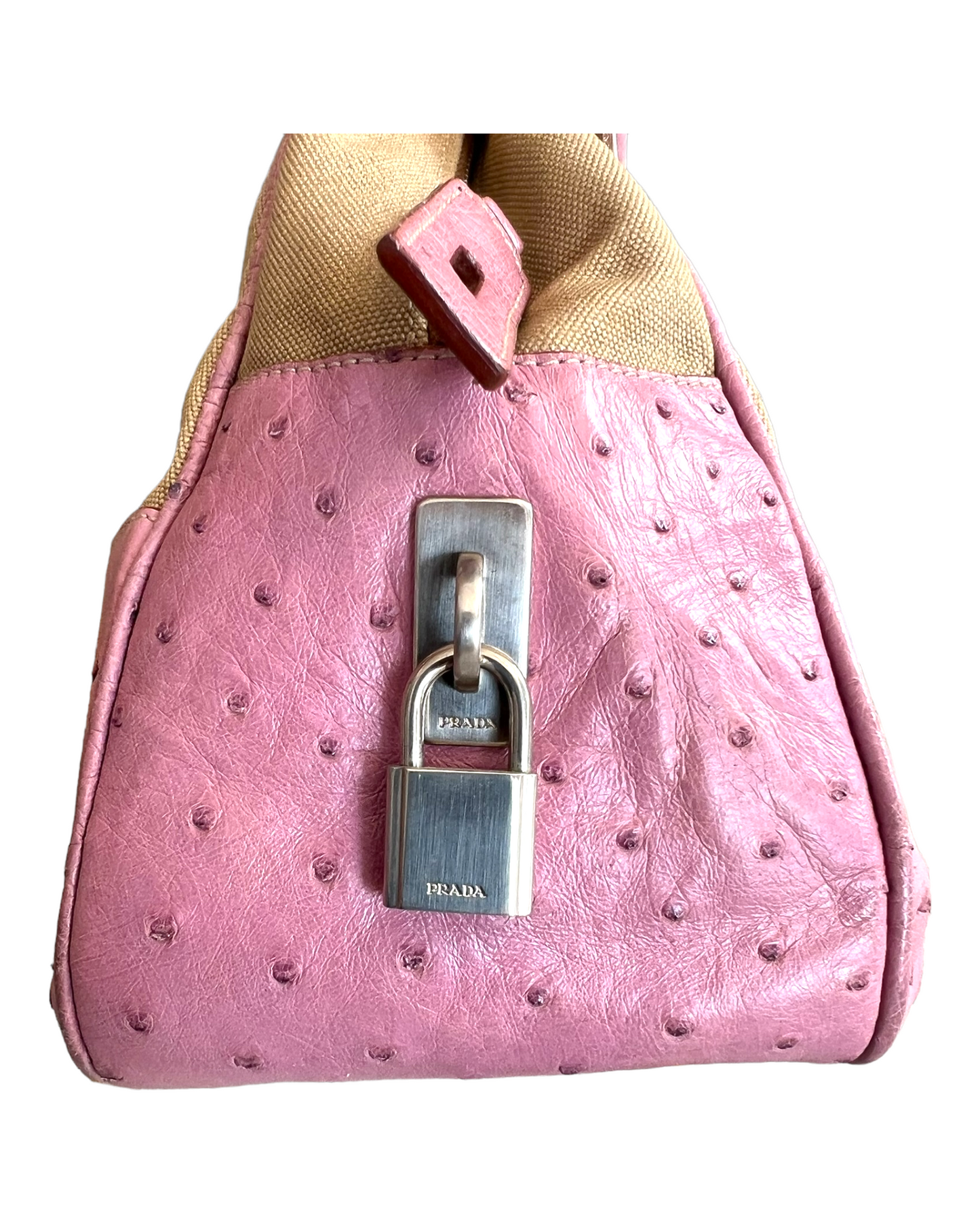 Vintage Prada Beige Canapa Canvas Bowling Bag with Pink Ostrich Leather Trim. Image depicts a lock with PRADA logo