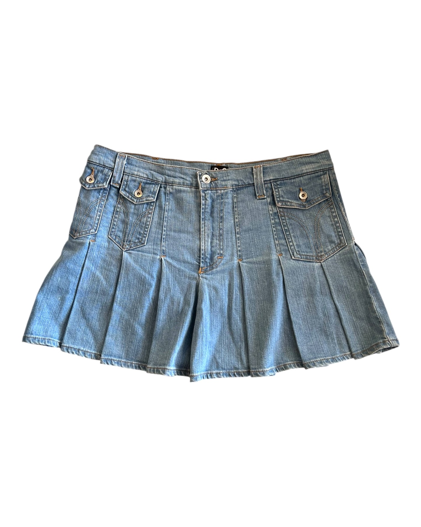 Vintage D&G "Pin Up" Mini Blue Denim Skirt. Skirt features three pockets on the front and a pleated peplum shape.