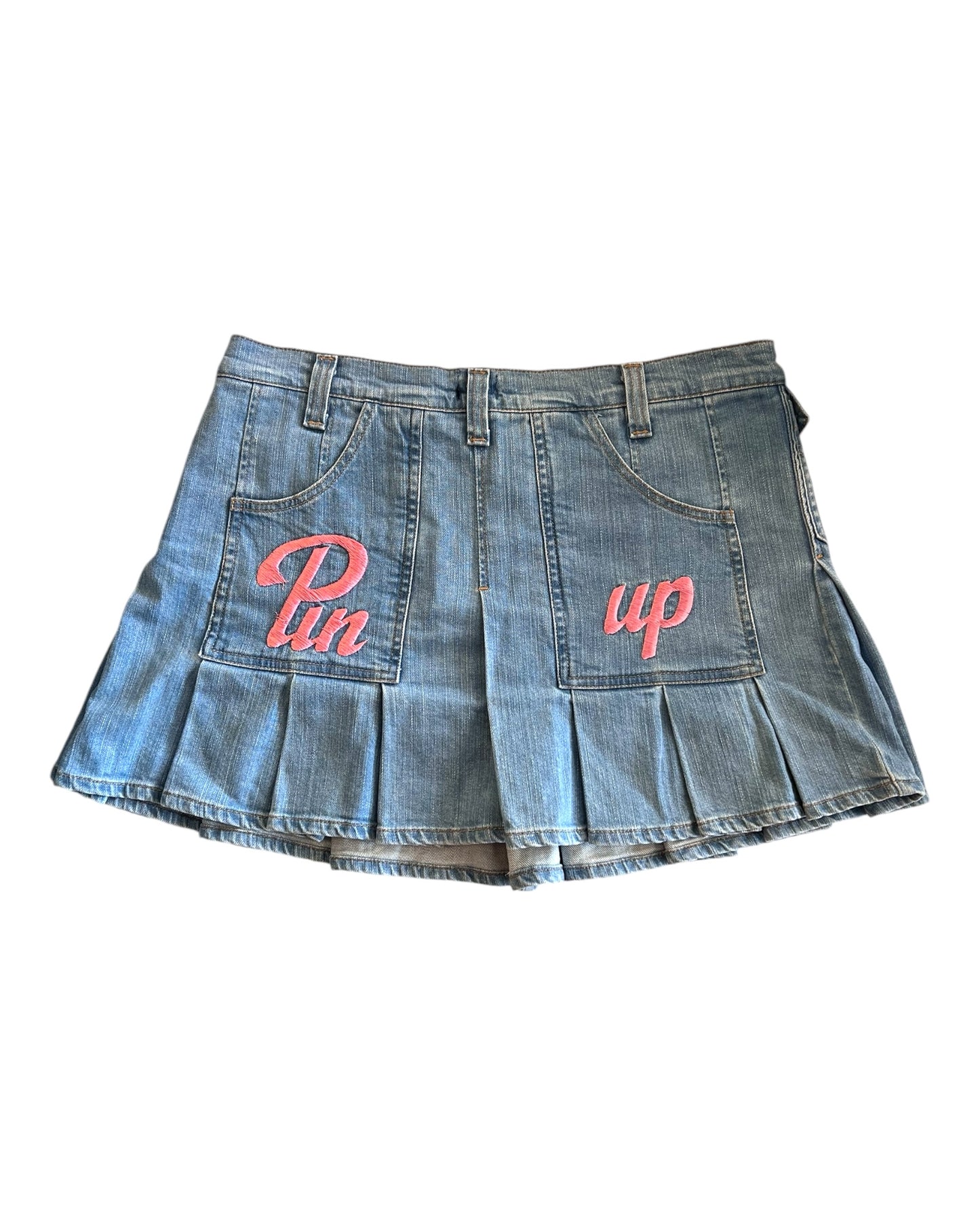 Vintage D&G "Pin Up" Mini Blue Denim Skirt. Back Pockets feature the phrase "Pin Up" written in pink embroidery.