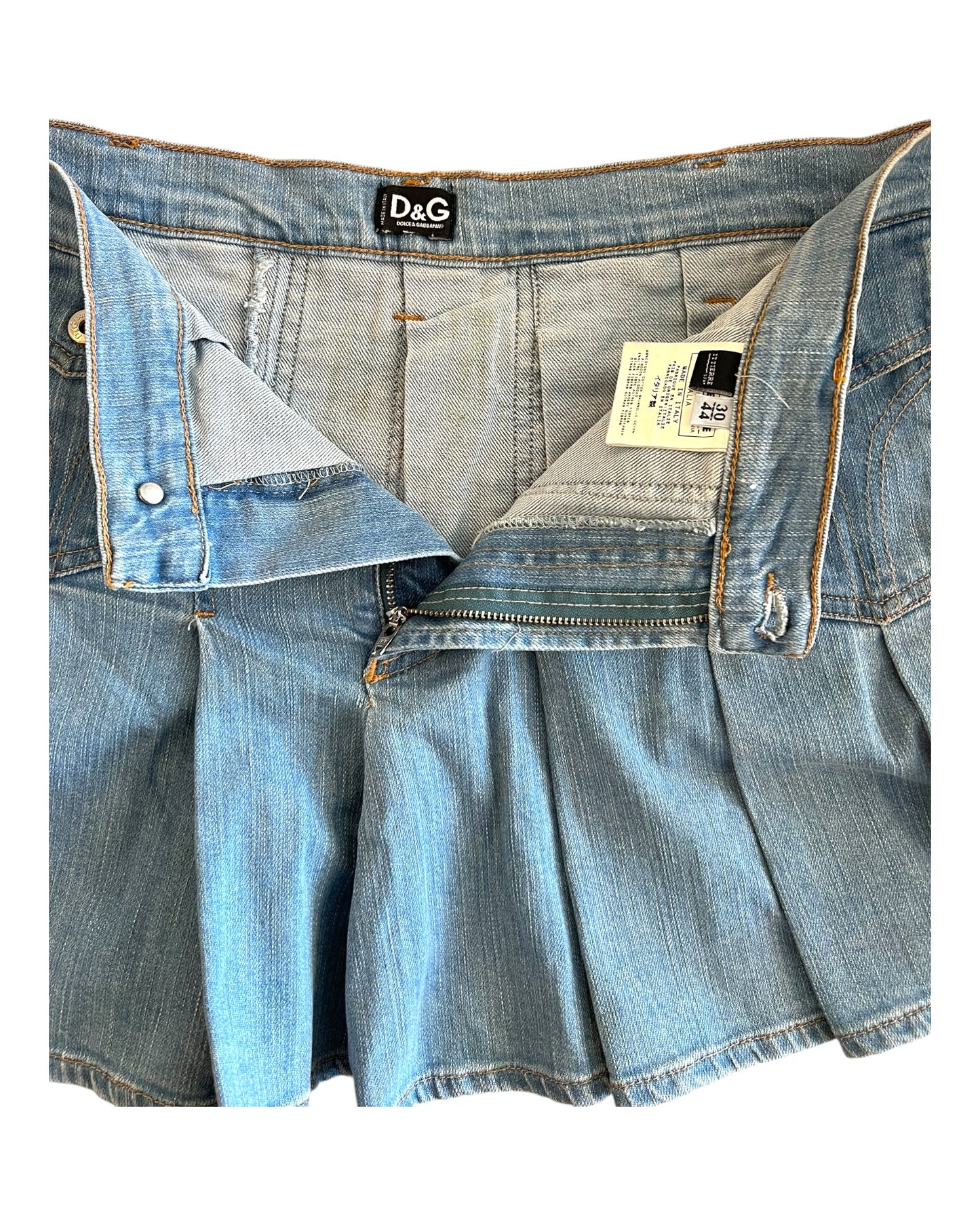 Vintage D&G "Pin Up" Mini Blue Denim Skirt. Image shows inside of skirt with brand tags.