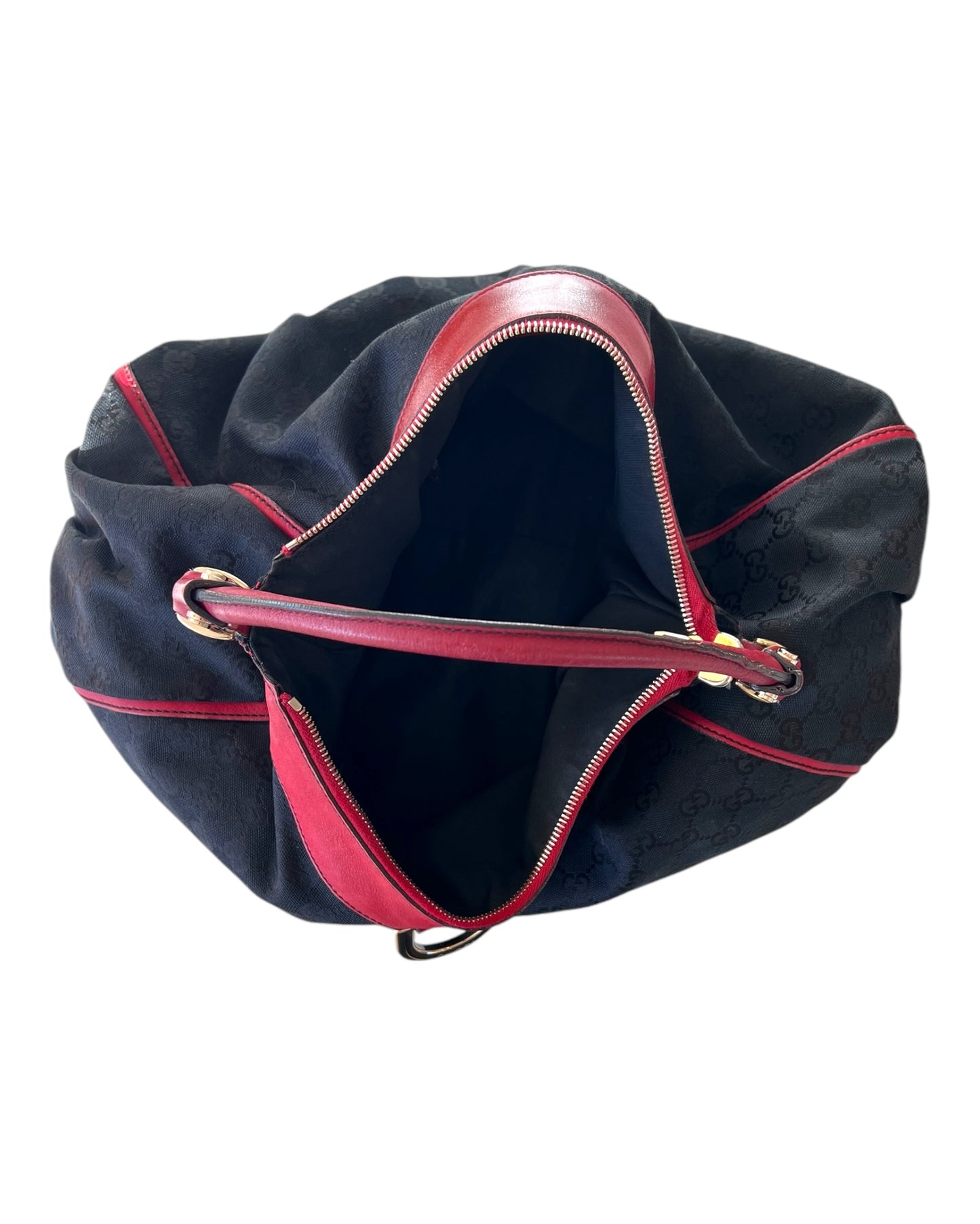 Vintage Gucci Red and Black Logo Abbey Tote Bag. Bag Features a black canvas body with the GG Logo throughout and red leather trim with metal hardware.