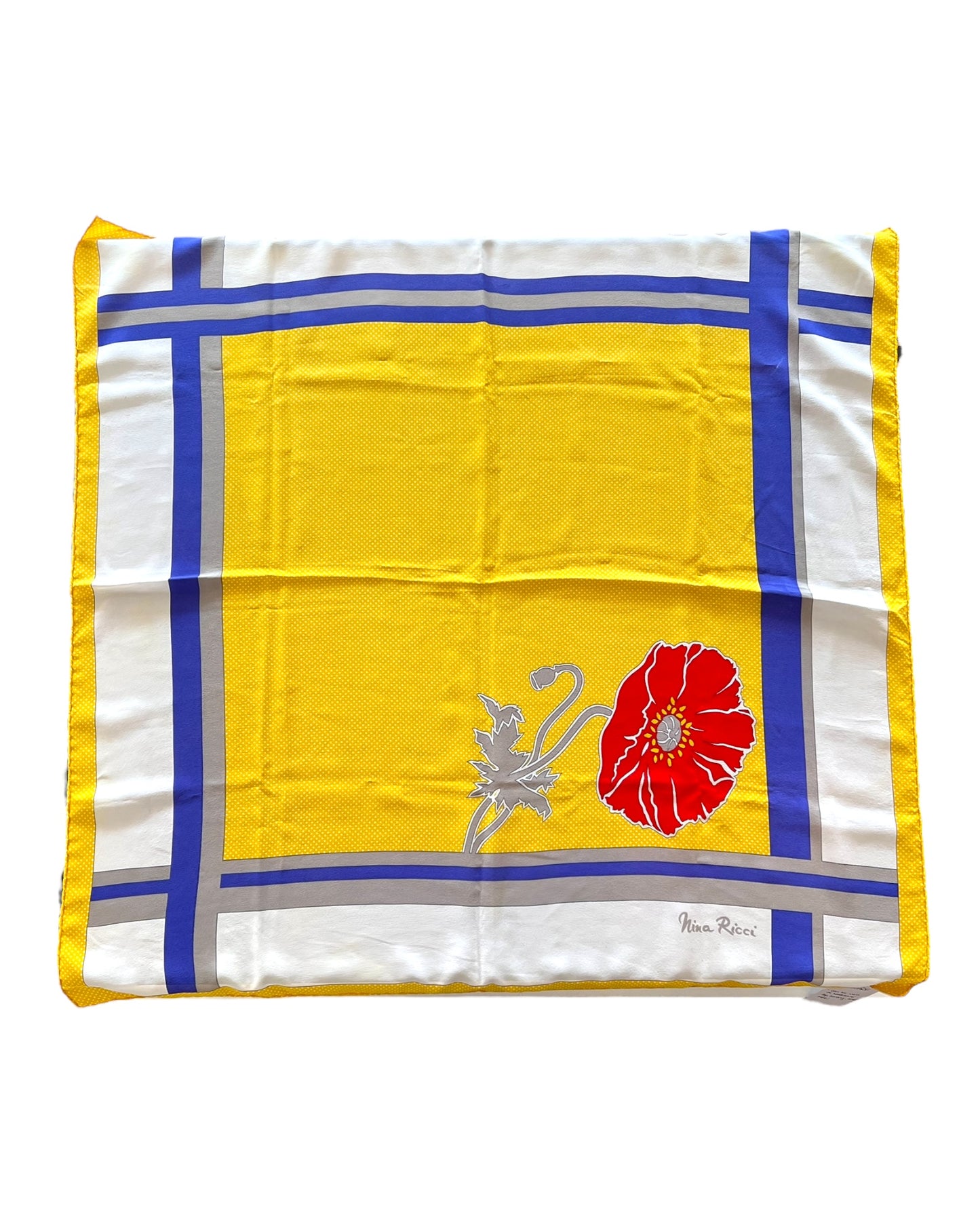 Vintage Nina Ricci Yellow Floral Silk Scarf. features a blue and white boarder with a red flower.