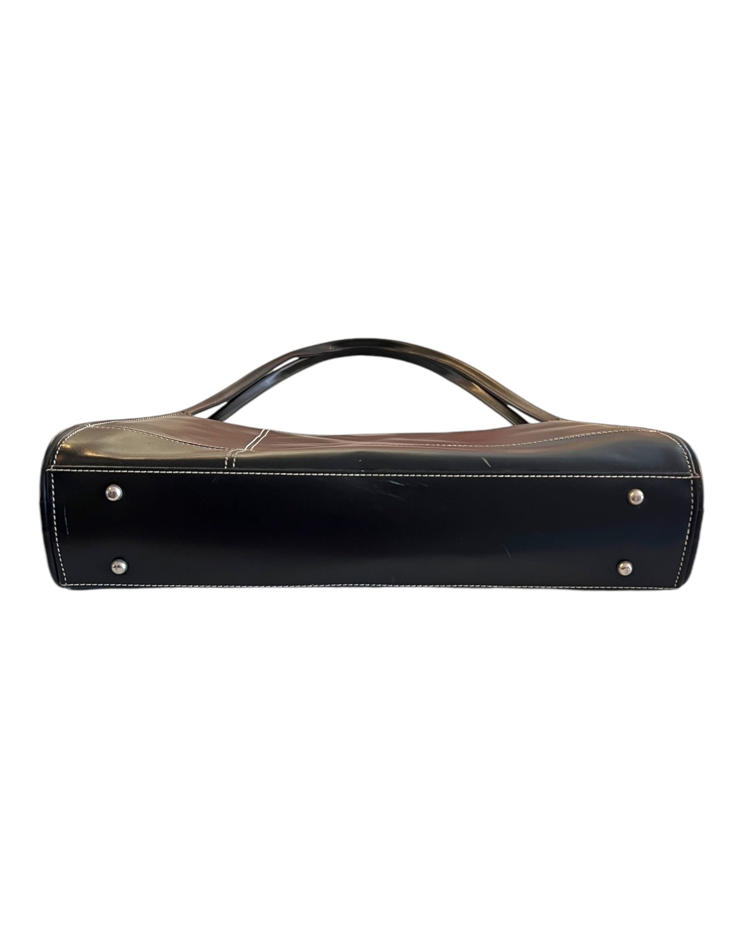 Vintage Black Leather Structured Bag. Features white stitching to add detail and interest. Image shows the footed bottom of the bag.