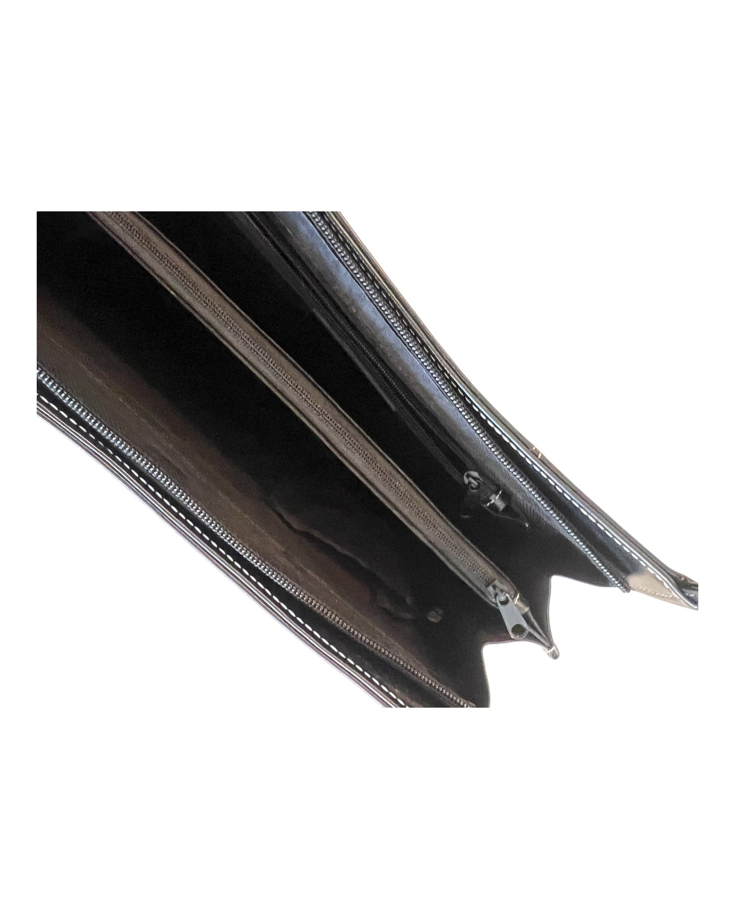 Vintage Black Leather Structured Bag. Features white stitching to add detail and interest. Image shows zipper closure.