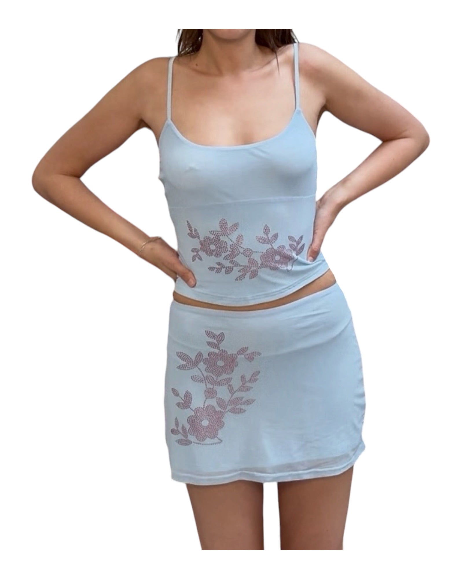 Light blue tank top and skirt set with floral embroidery on a white background