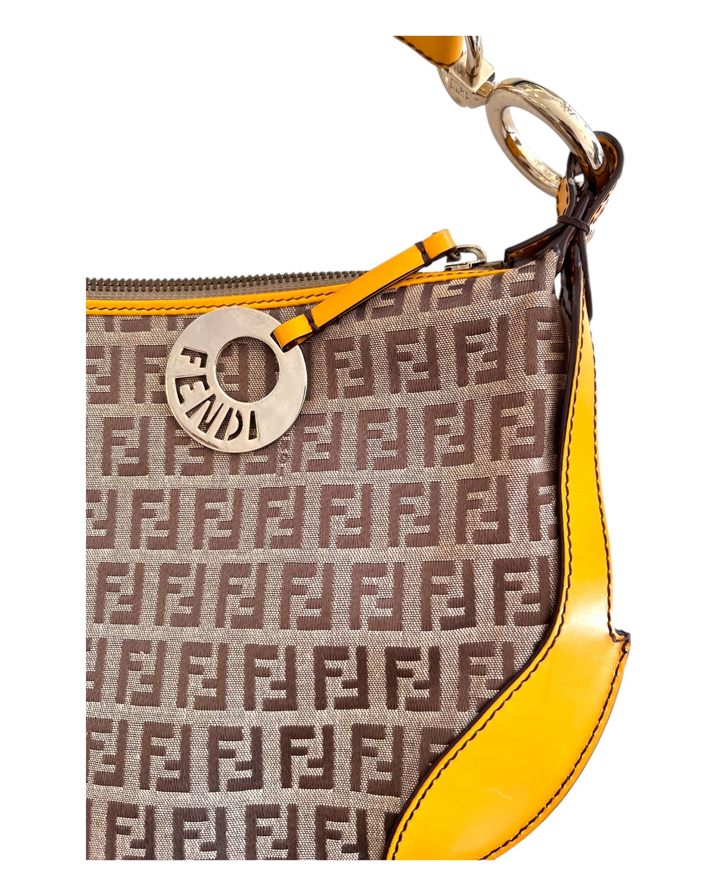 Vintage Fendi Logo Croissant Bag with yellow leather trim and silver-tone metal "FENDI" charm.