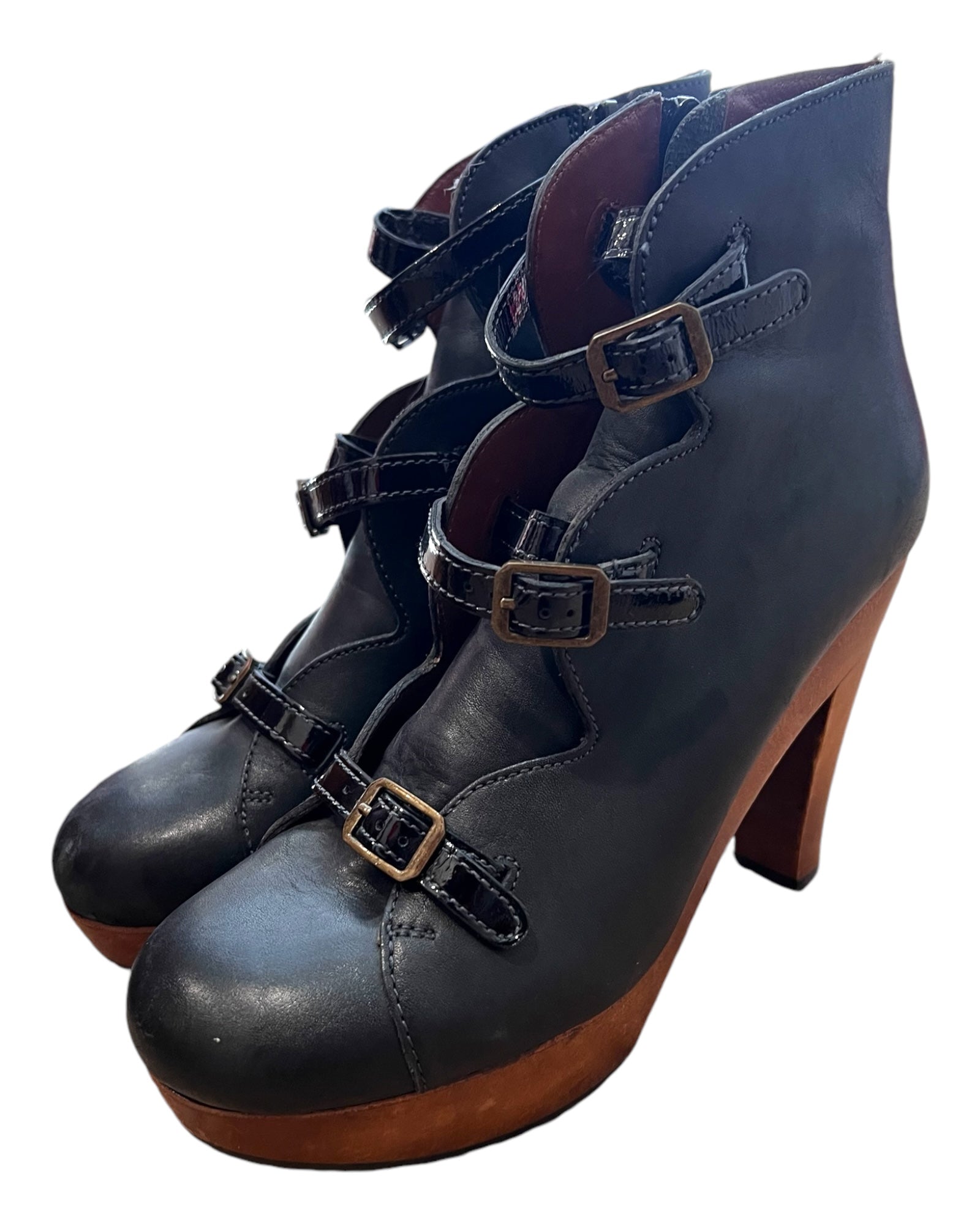 Vintage Chloé Black Leather Platform Heels. Features three buckle details and a wooden sole.