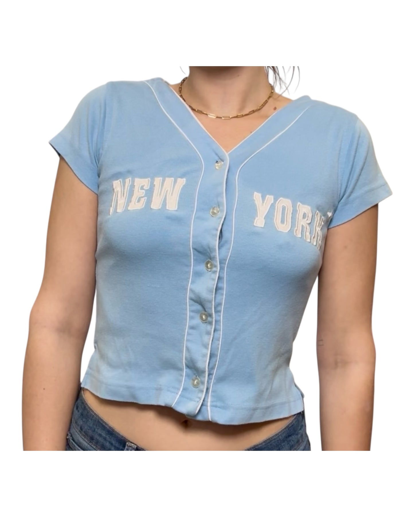 Light blue baseball-style shirt with 'New York' text on a white background