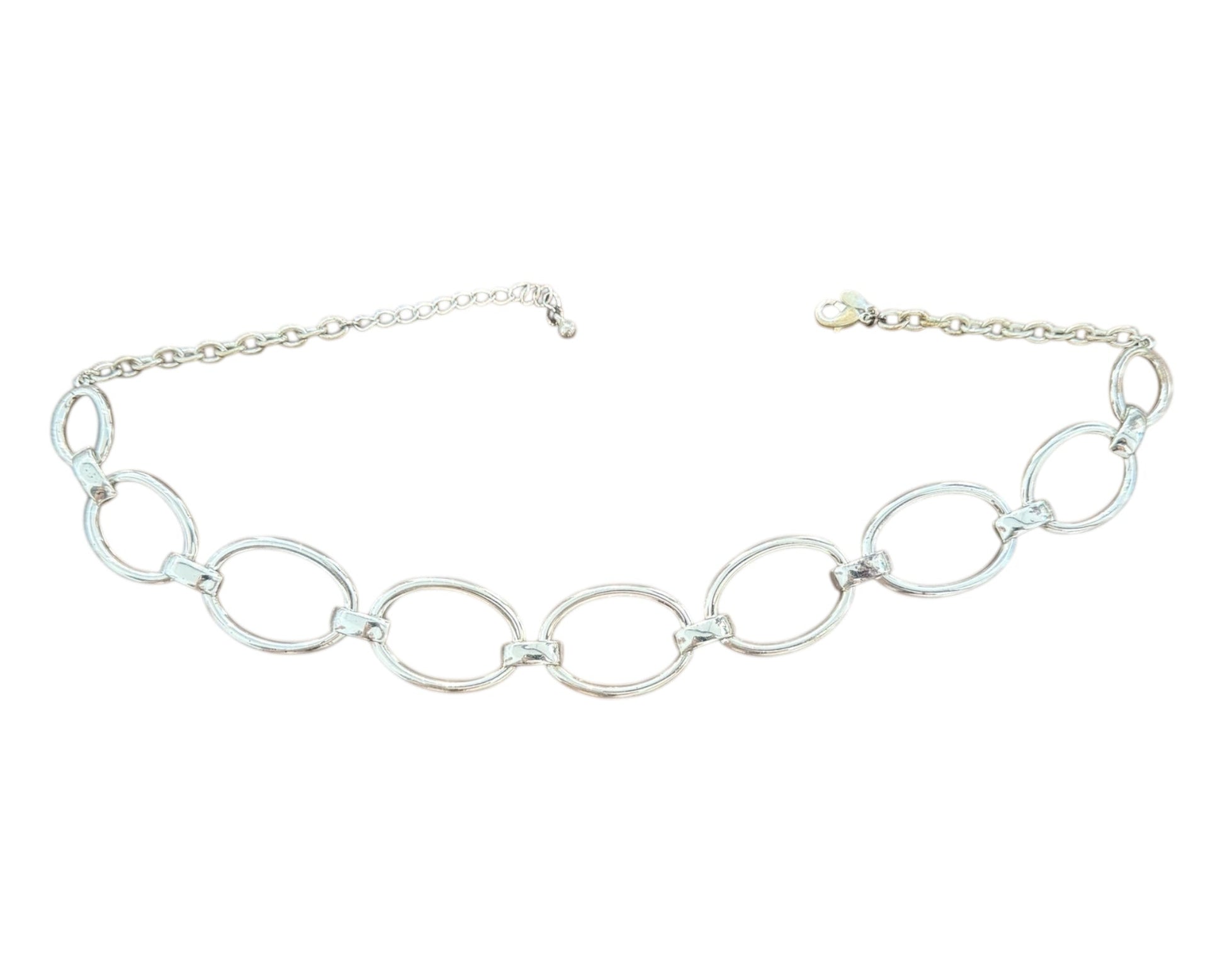 Silver chain necklace on a white background