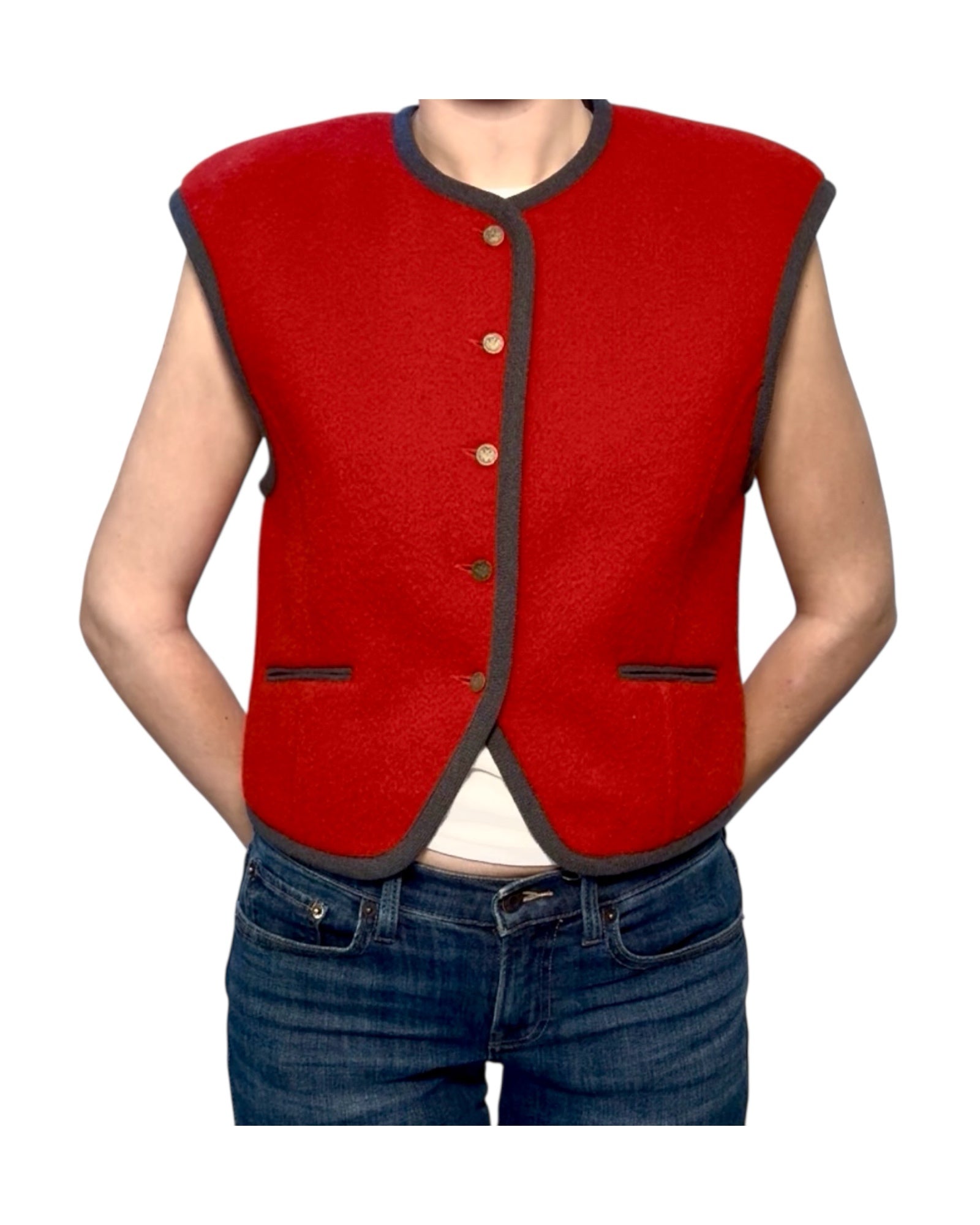 Red vest with black trim worn by a person on a white background